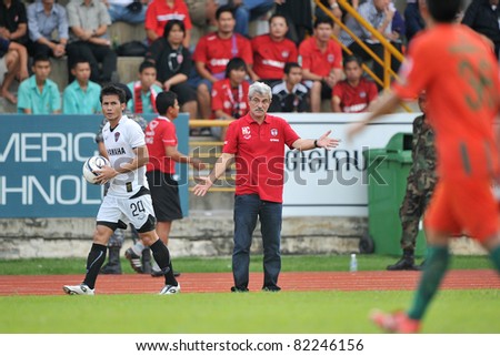 PATHUMTHANI,THAILAND-AUG,2: Henrique Calisto Head Coach of MTUTD during in Toyota League Cup match 2 Round of 16 teams between KU and MTUTD at Thupatemee Stadium :Aug 2,2011.Pathumthani,Thailand.