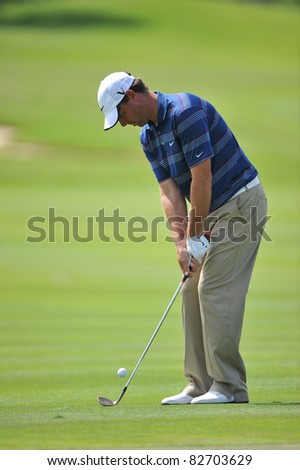 NAKHONPATHOM,THAILAND - AUG 12:Kim Felton of AUS in action during day two of the 2011 Thailand Open at Suwan Golf&Country Club on August 12, 2011 in Nakhonpathom Thailand