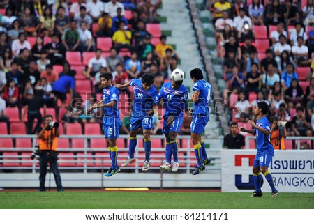 BANGKOK THAILAND - SEPTEMBER 6 : Football Team of Thailand in action during FIFA WORLD CUP 2014 (Round 3), between Thailand(B) and Oman(R) at Rajamangla Stadium on September 6, 2011 Bangkok, Thailand.