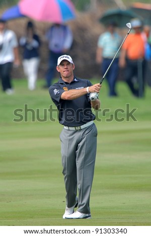CHONBURI, THAILAND - DECEMBER 15: Lee Westwood of England plays a shot during day one of the Thailand Golf Championship at Amata Spring Country Club on December 15, 2011 in Chonburi, Thailand.