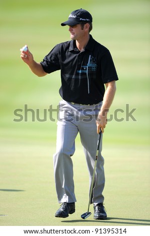 CHONBURI, THAILAND - DECEMBER 15:Berry HENSON of United States plays a shot during day one of the Thailand Golf Championship at Amata Spring Country Club on December 15, 2011 in Chonburi, Thailand.