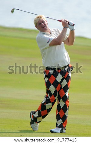 CHONBURI,THAILAND - DECEMBER 15:John Daly of United States plays a shot during day one of the Thailand Golf Championship at Amata Spring Country Club on December 15, 2011 in Chonburi, Thailand.