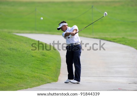 CHONBURI,THAILAND - DECEMBER 15: Sukree OTHMAN of 	Malaysia plays a shot during day one of the Thailand Golf Championship at Amata Spring Country Club on December 15, 2011 in Chonburi, Thailand.