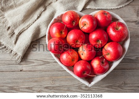 Red apples on a table
