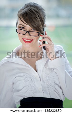 Girl talking by mobil phone
