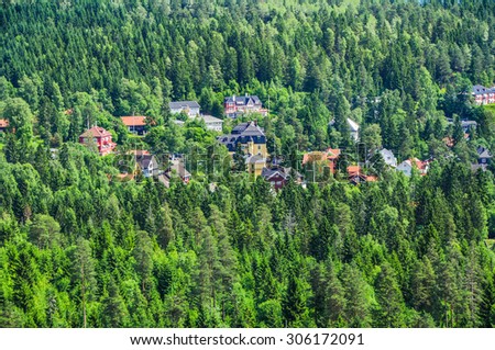 Houses in the middle of the forest in Oslo - green area and healthy living