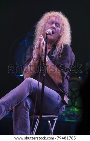 ANAHEIM, CA - JUNE 18: David Montgomery of Led Zeppelin tribute band, Led Zepagain, portrays Robert Plant here, while singing his heart out to fans at The Grove in Anaheim, CA on June 18, 2011.