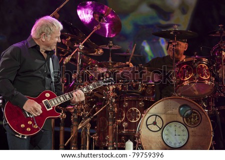 UNIVERSAL CITY, CA - JUNE 22: Alex Lifeson & Neil Peart of the rock band Rush hits the stage for part of their Time Machine Tour at the Gibson Amphitheater in Universal City, CA on June 22, 2011.