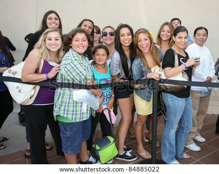 CERRITOS, CA - SEPTEMBER 18: Fans line outside of Sears to meet the Kardashian sisters for the launch of their brand new clothing line, \