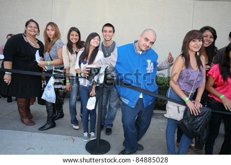 CERRITOS, CA - SEPTEMBER 18: Fans line outside of Sears to meet the Kardashian sisters for the launch of their brand new clothing line, \