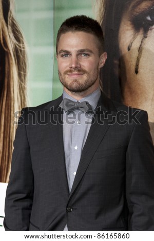 stock photo LOS ANGELES CA OCTOBER 06 Stephen Amell arrives at the