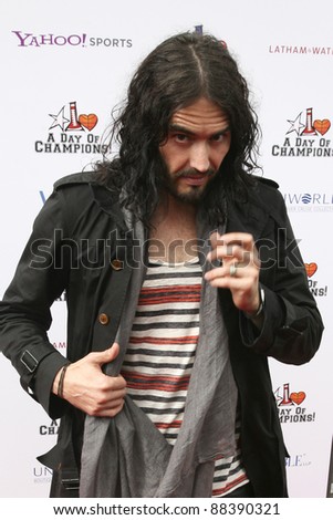LOS ANGELES, CA - NOVEMBER 06: Russell Brand arrives at A Day Of Champions Benefiting the Bogart Pediatric Cancer Research Program at Sports Museum of Los Angeles on November 6, 2011.