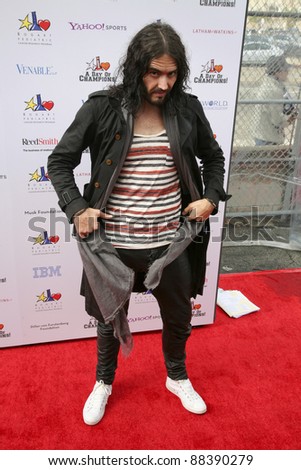 LOS ANGELES, CA - NOVEMBER 06: Russell Brand arrives at A Day Of Champions Benefiting the Bogart Pediatric Cancer Research Program at Sports Museum of Los Angeles on November 6, 2011.