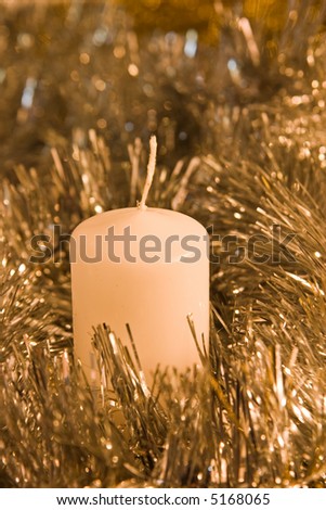 Candle in silver tinsel