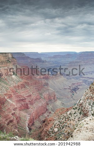 view of the grand canyon from one of the many point view during a  cloudy day