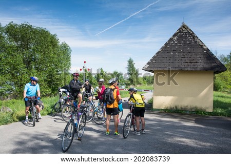 WACHAU VALLEY,AUSTRIA-MAY 9,2014:group of cyclists is resting at cycle path near danube river in Austria during a sunny day