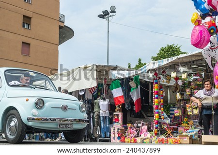 SAN AGATA,BOLOGNA,ITALY-MAY 27,2012:meeting of classic cars in the street of city in a sunny day.