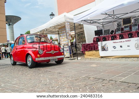 SAN AGATA,BOLOGNA,ITALY-MAY 27,2012:meeting of classic cars in the street of city in a sunny day.