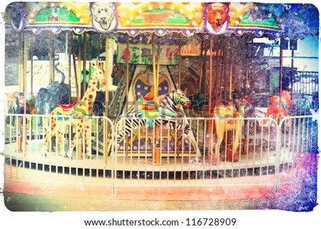 a small merry go round at a zoo
