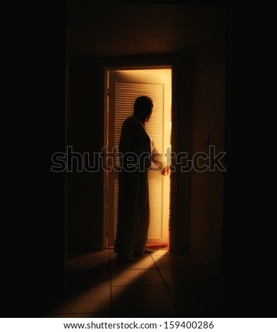 A Person Outside A Bedroom Door