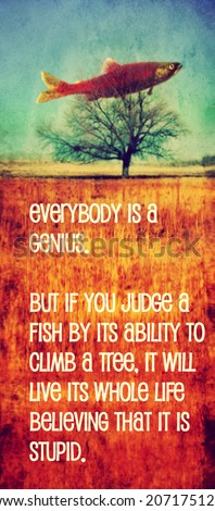 a quote with a fish in a tree toned with a warm instagram like filter (image is blurred - focus on the text)