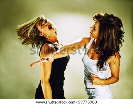 a woman hitting another woman