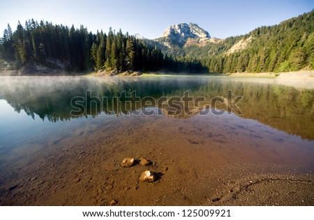 smooth water of mountain lakes