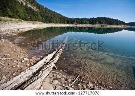 Smooth water of mountain lake