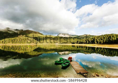 Lake in mountain, boats