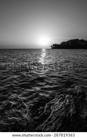 sunset at sea black and white