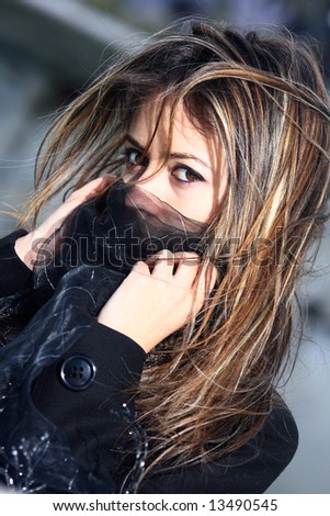healthy beautiful long hair in motion created by wind, fashion look