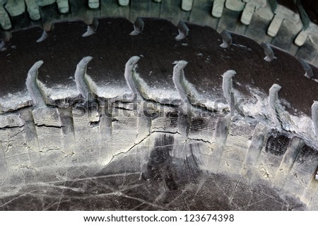 Closeup on rubber tire tread of car wheel tire texture