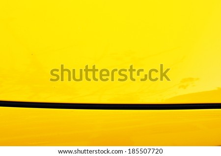 close up detail of yellow car