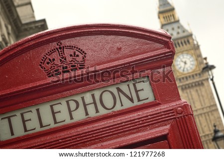 Big Ben clock tower and classic telephone booth in London