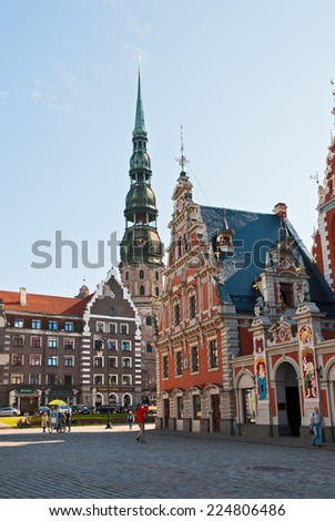 RIGA, LATVIA. SEPTEMBER 01, 2014 - City Hall square, Blackheads House and the Cathedral of St. Peter in the center of Riga