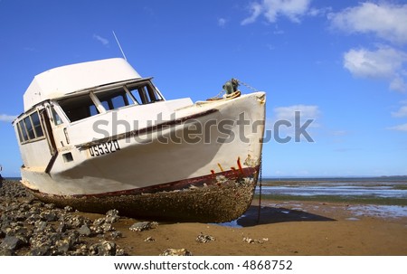 boat washed to shore in storm