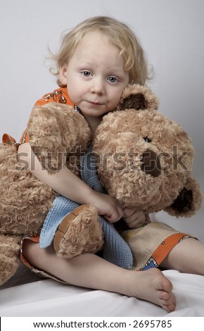 little boy with teddy bear