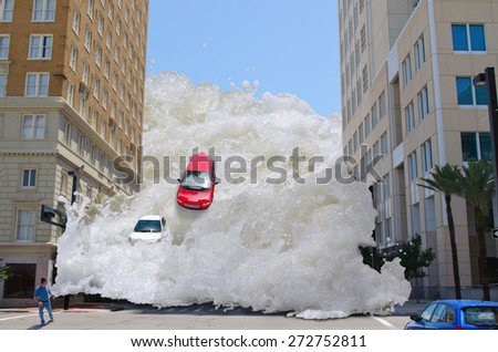 Tsunami tidal wave washing through a city street pushing cars out of the way and speeding towards a pedestrian