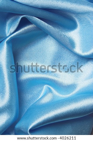 Blue silk folded cloth, soft and shiny.