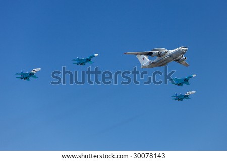 MOSCOW - MAY 9 : Russian Air Force airplanes (airborne early warning A-50 Shmel and jet fighters Su-27) at Moscow Victory Parade May 9, 2009 in Moscow.
