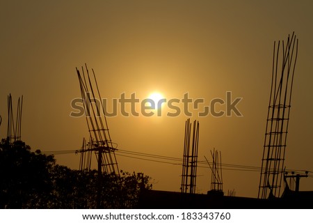 Construction site of the new retail building at sunset,Silhouette