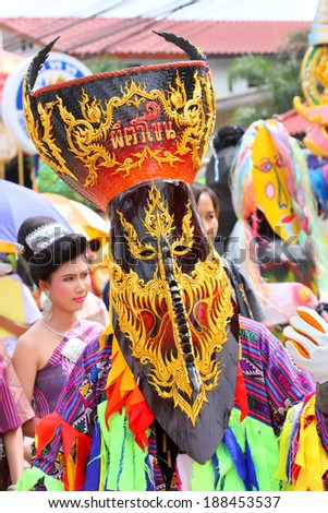 LOEI ,THAILAND-JUNE 26: Ghost Festival (Phi Ta Khon) is a type of masked procession celebrated on Buddhist merit- making holiday known in Thai as\