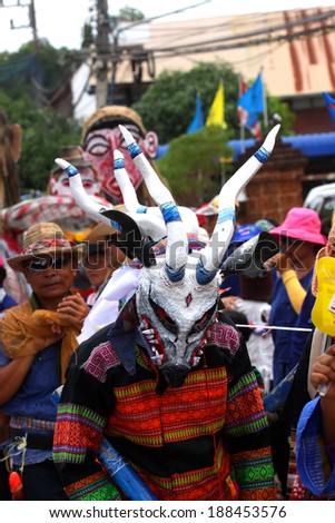 LOEI ,THAILAND-JUNE 26: Ghost Festival (Phi Ta Khon) is a type of masked procession celebrated on Buddhist merit- making holiday known in Thai as\