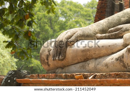 Old stucco Buddha hands