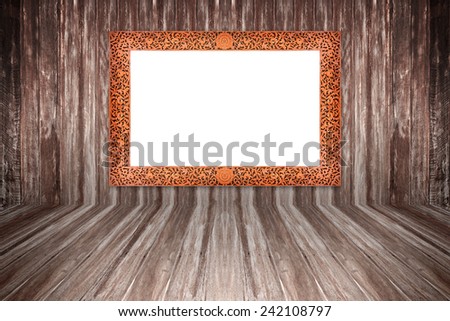Wooden frame isolated on wooden wall