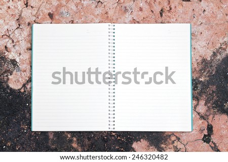 Blank book on the stone table