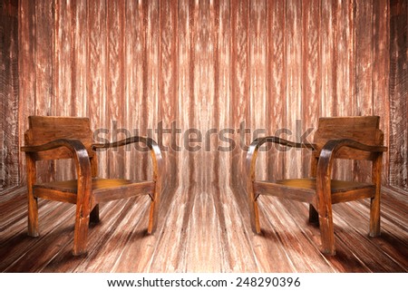 Chair in a room with walls of wood for various tasks