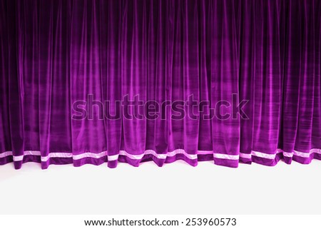 Purple closed velvet curtain in theater