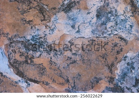 The pattern on the stone that looked like a map or manuscript, Multicolored stone in natural pattern,The mix of colors in the form of natural stone, marbled