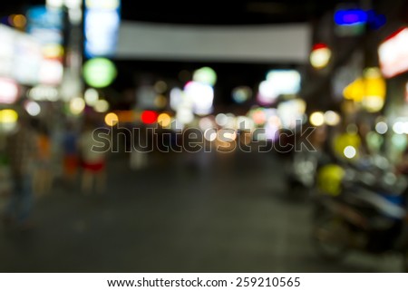 Blurred tourists walking on the street at night on Koh Samui, Chaweng Beach, Surat Thani, Thailand